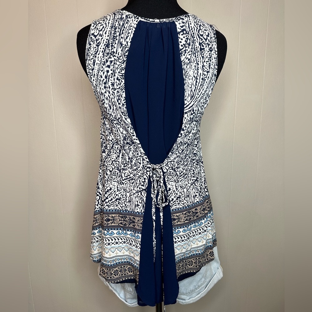 Tank with tie back and mesh insert.